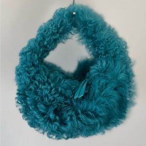 BY FAR Lamb Fur Baby Cush Bag in Azur-Blue